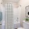 shower/tub combo in well lit bathroom
