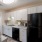 kitchen with white cabinets