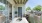 furnished private porch with railing